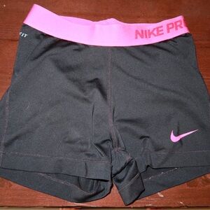 Nike Black and Pink Athletic Shorts with Elastic Waistband